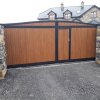 belvedere sliding gate with pedesrian door golden oak